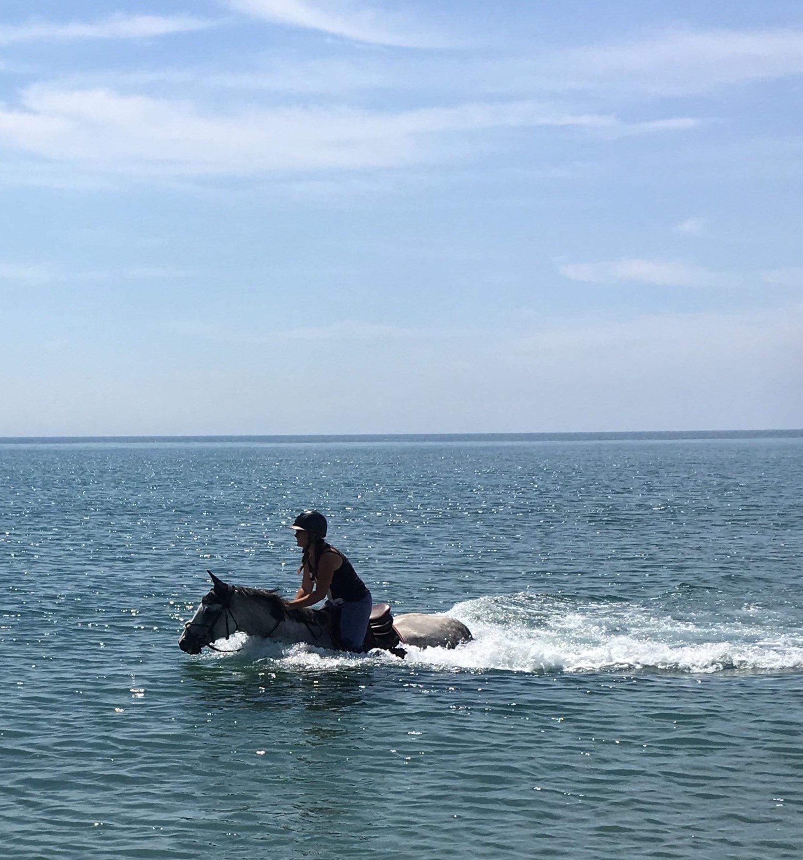 Pack Loisir - Cavalière et cheval dans l'eau de mer